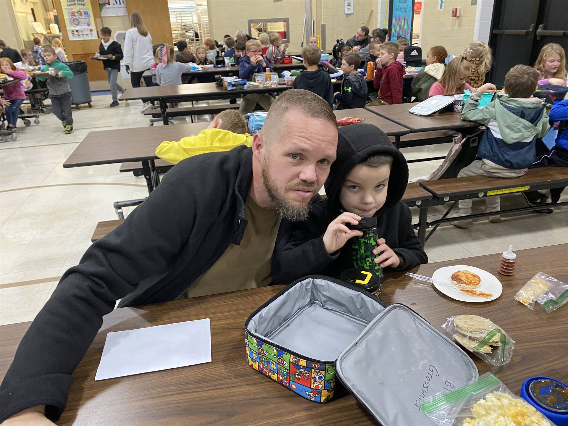 Blake and his dad stop for a picture on Veterans Day 2024!!