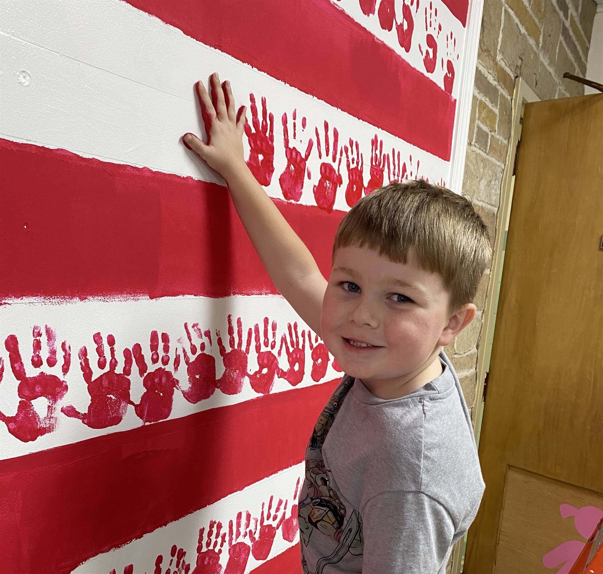 Brody Smarr helps create our flag project!!!